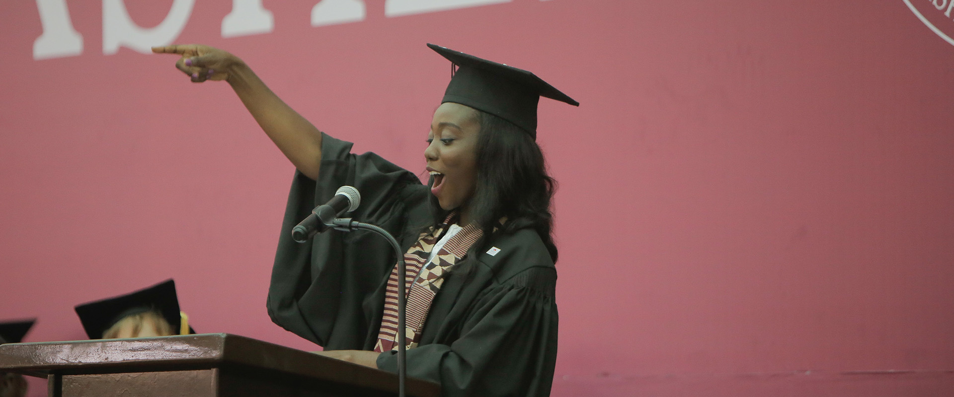 <p>Class speaker, Aba Wilmot, shares journey of Graduating Class with guests</p>